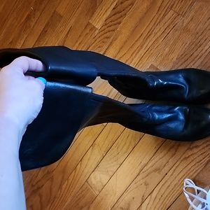 Guess over or just under the knee boots.  Soft leather inside mid zipper.